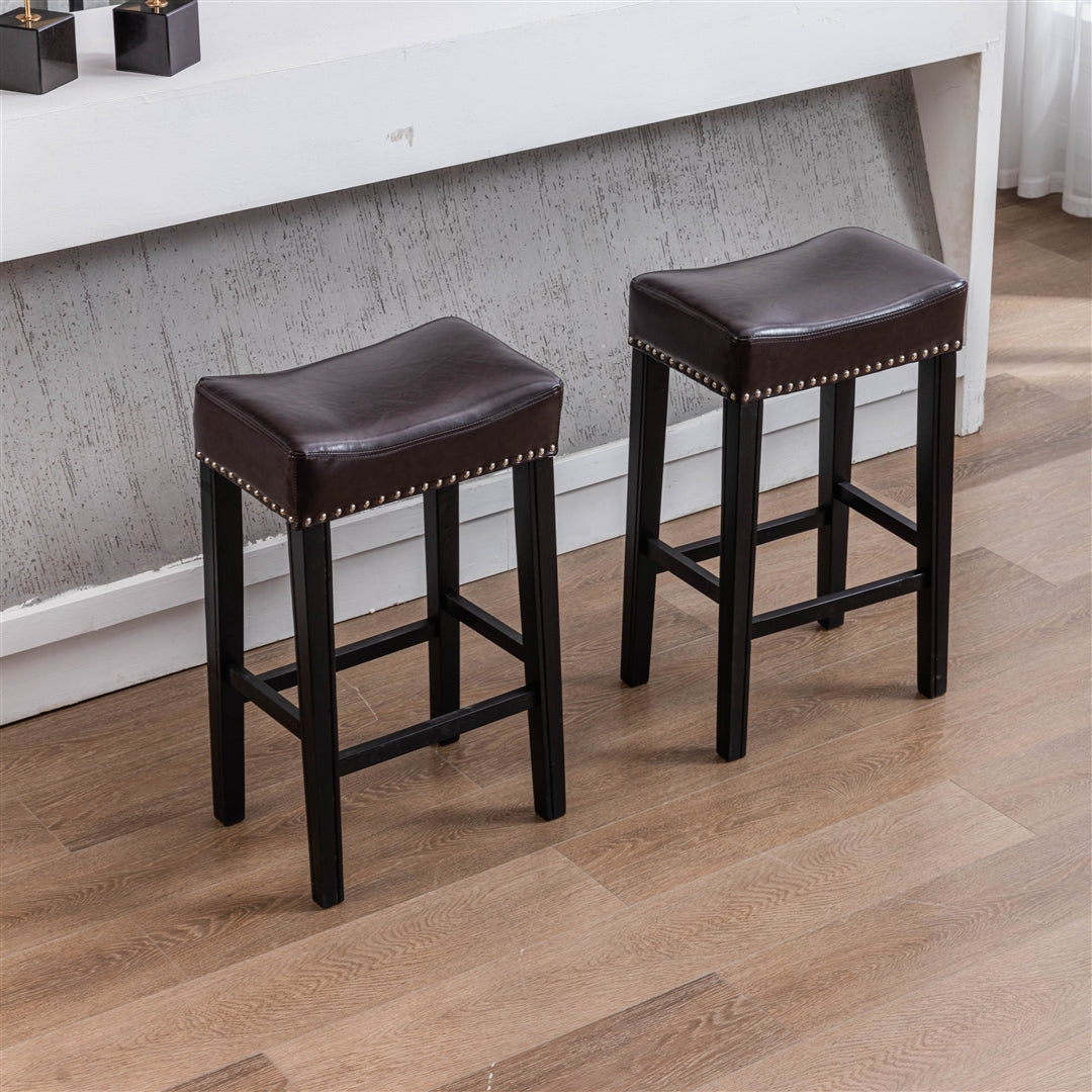 2x Wooden Legs Saddle Bar Stools Leather Padded Counter Chairs with studs Brown 74.5cm Height Odin Furniture