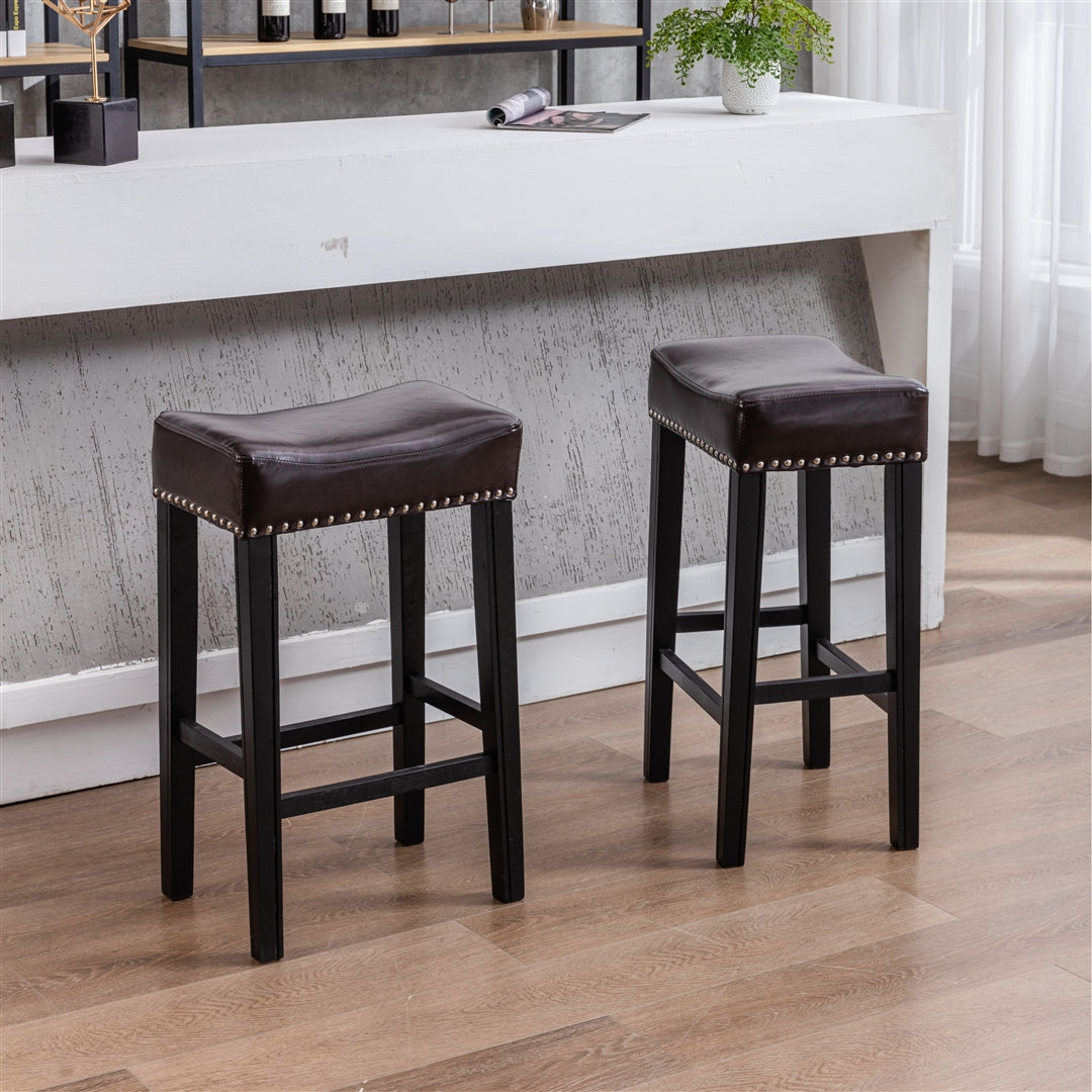 2x Wooden Legs Saddle Bar Stools Leather Padded Counter Chairs with studs Brown 74.5cm Height Odin Furniture